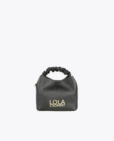 Crossbody bag with gathered strap