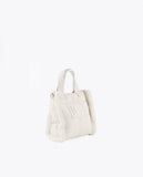 Faux leather and faux fur crossbody bag