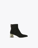 Ankle boots with golden heel