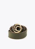 Belt with gold-toned trim