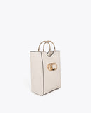 Mini shopper with round metal handle in faux leather and oval LC logo