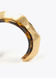 Tortoiseshell bracelet with metal piece