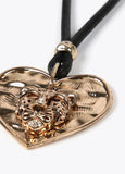 Necklace with gold-toned heart pendant