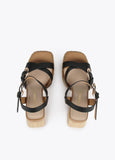 Heeled sandals with buckles