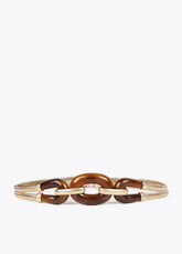 Stretch metal belt with tortoiseshell pieces
