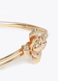 Stretch metal belt with flower