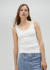 Knit top with rhinestone neckline