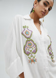 Cropped shirt with sleeves and chest embroidery
