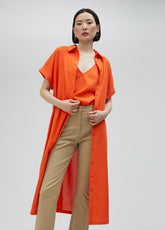 Long oversize blouse with rhinestone detail