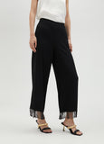 Trousers with fringing and rhinestones