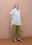 Oversized short sleeved shirt with perforated detailing