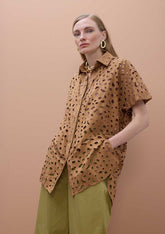 Oversized short sleeved shirt with perforated detailing