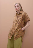 Oversized short sleeved shirt with perforated detailing