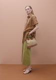 Oversized short sleeved shirt with perforated detailing