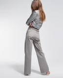 Trousers with laminated detail