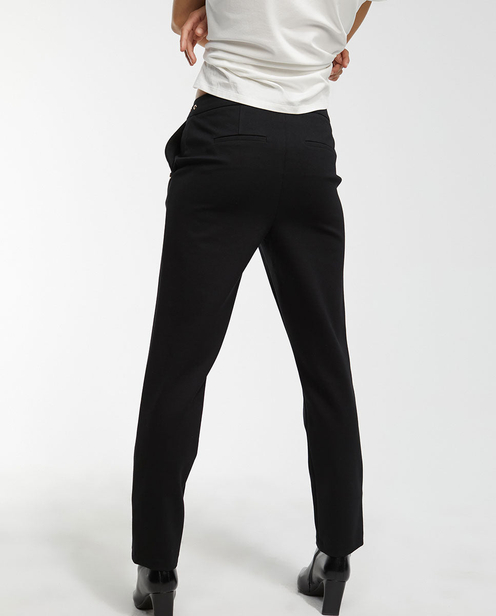 Trousers with eyelets