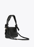 Crossbody bag with square metal eyelets