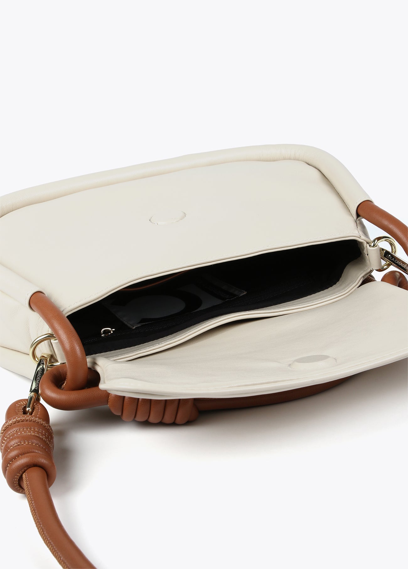 Crossbody flap bag with rounded handles