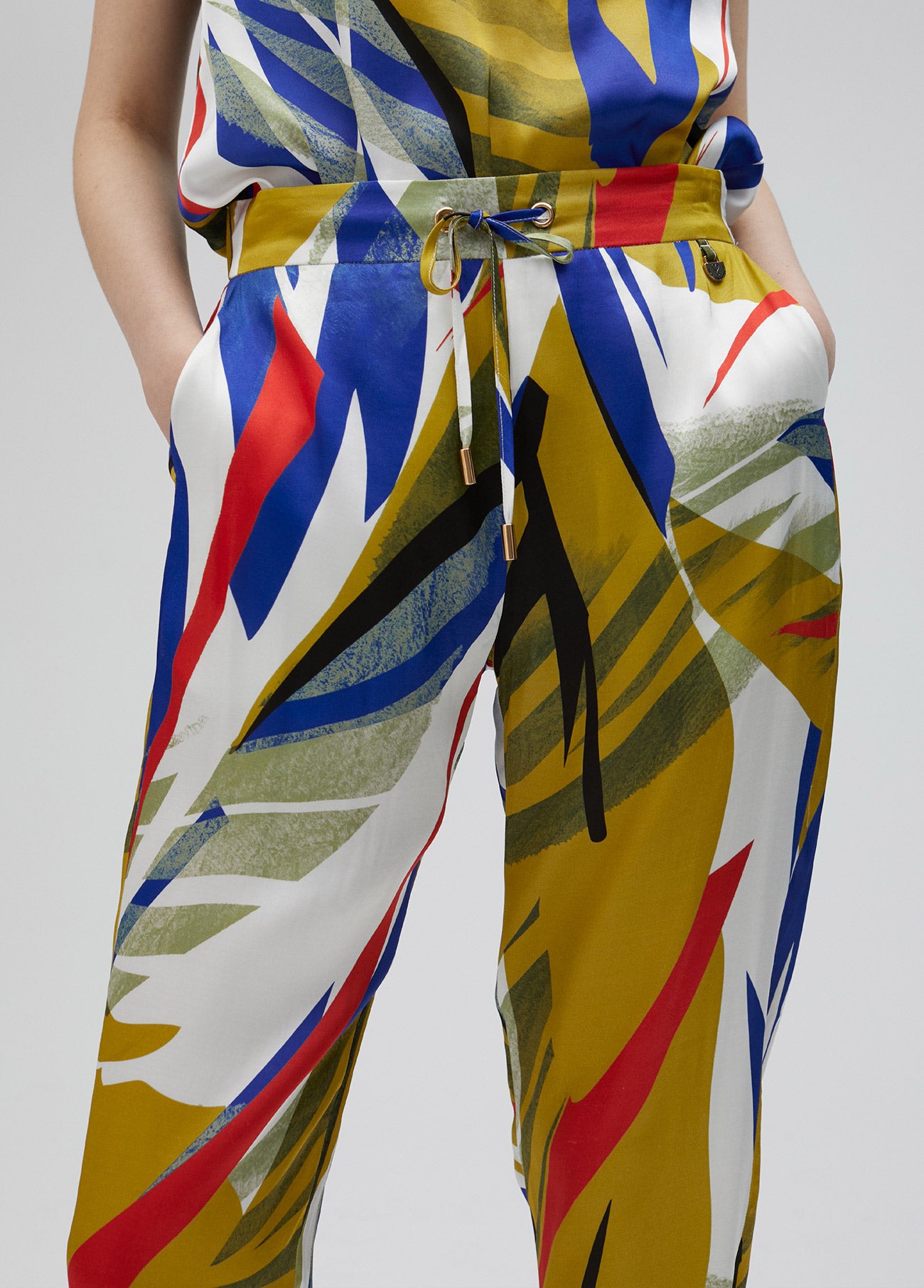 Tropical print satin joggers