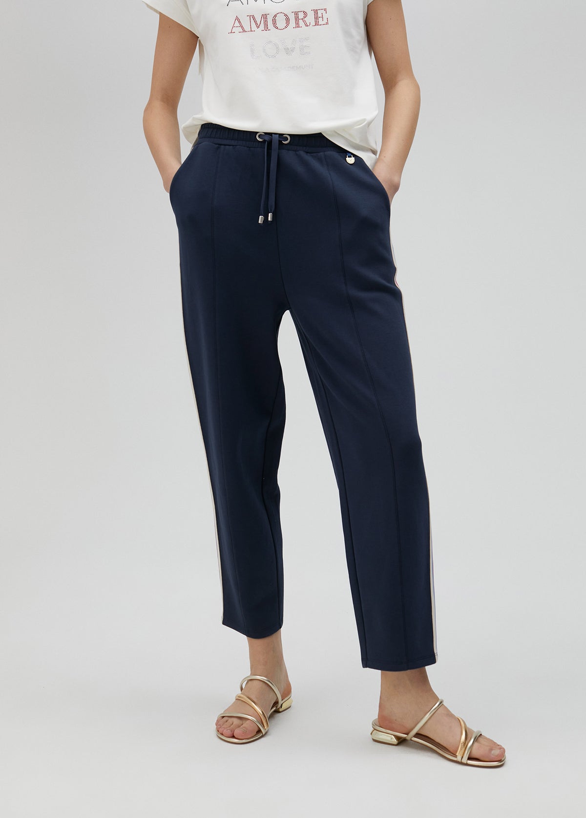 Trousers with rhinestone sporty stripes