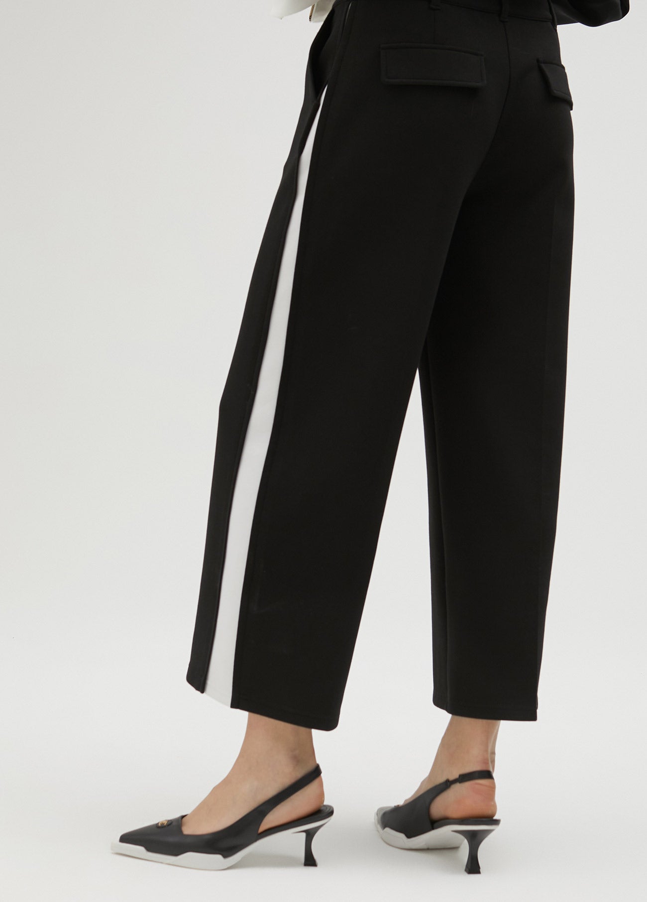 Black trousers with white side detail