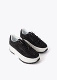 Trainers with transparent sole and rhinestone appliqués