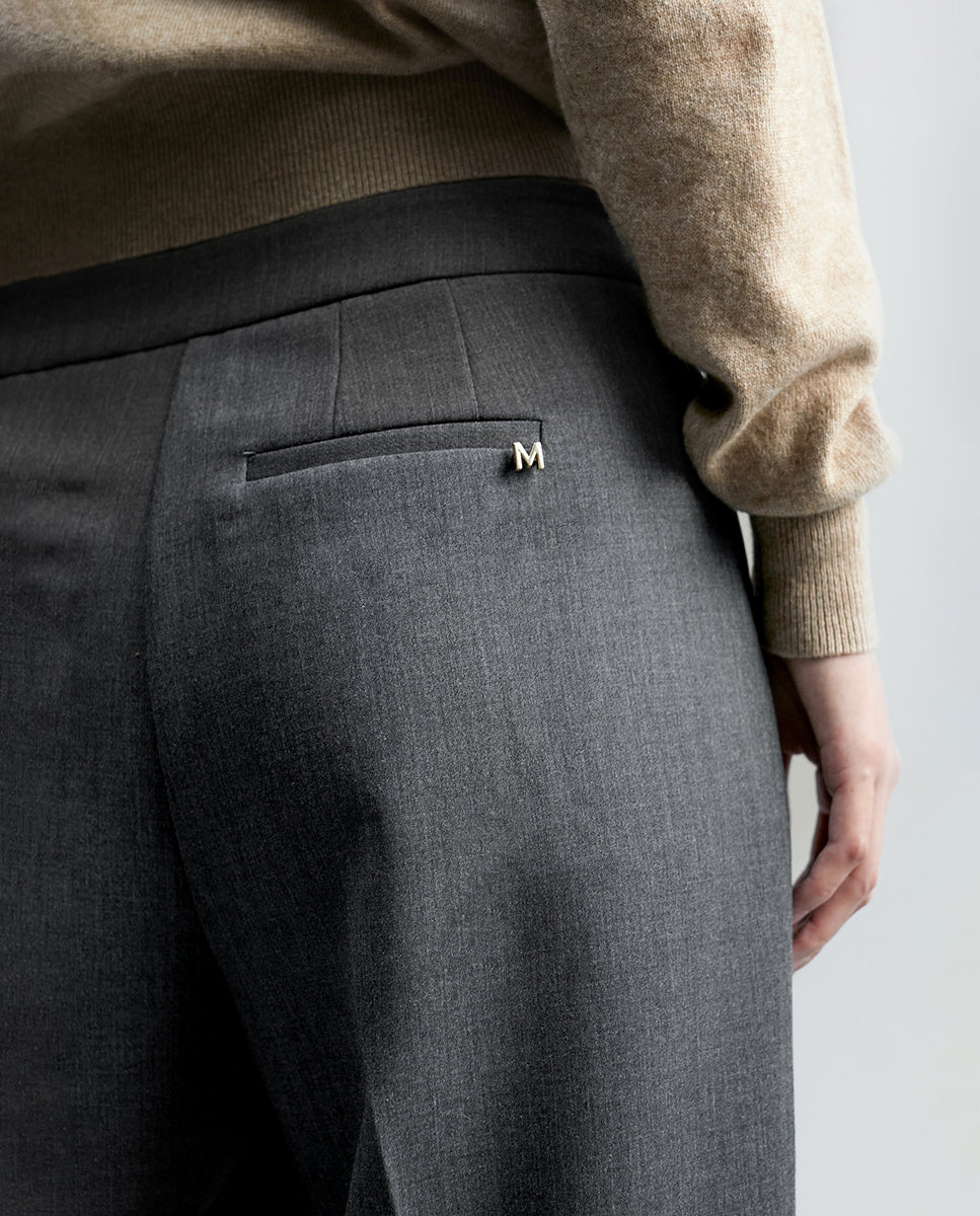 Wide-leg trousers with snap-button detail