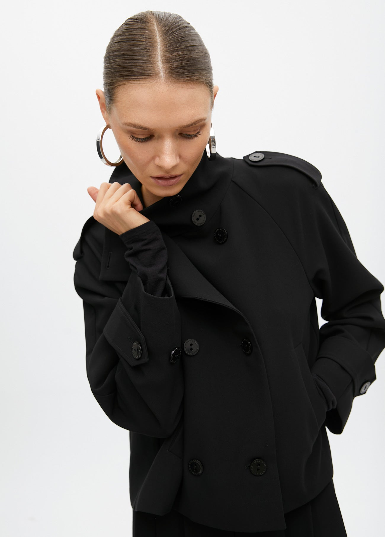 Short jacket with pleated detail on the back