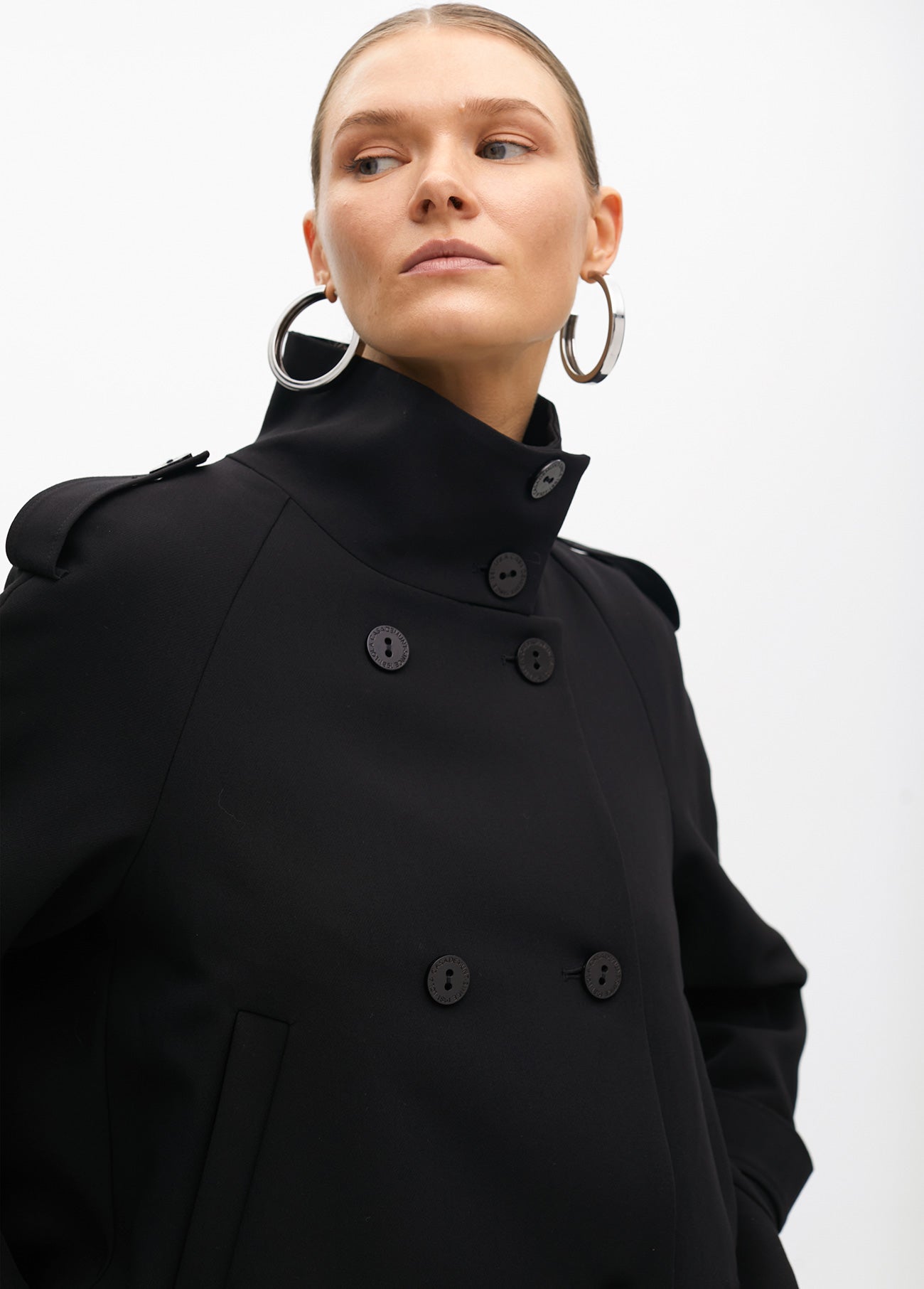 Short jacket with pleated detail on the back