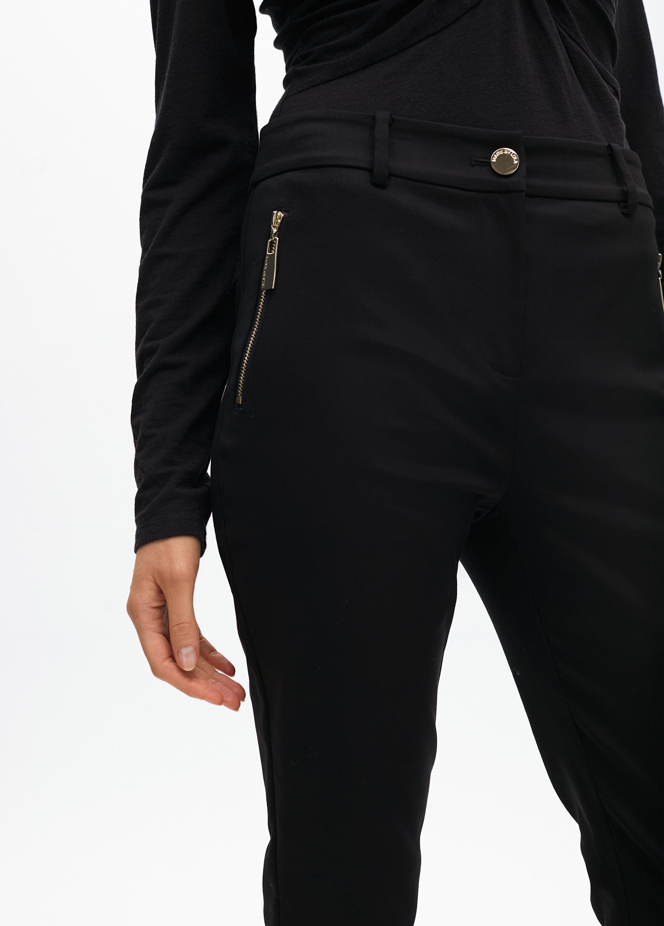 Stretch fabric trousers with zipped pocket