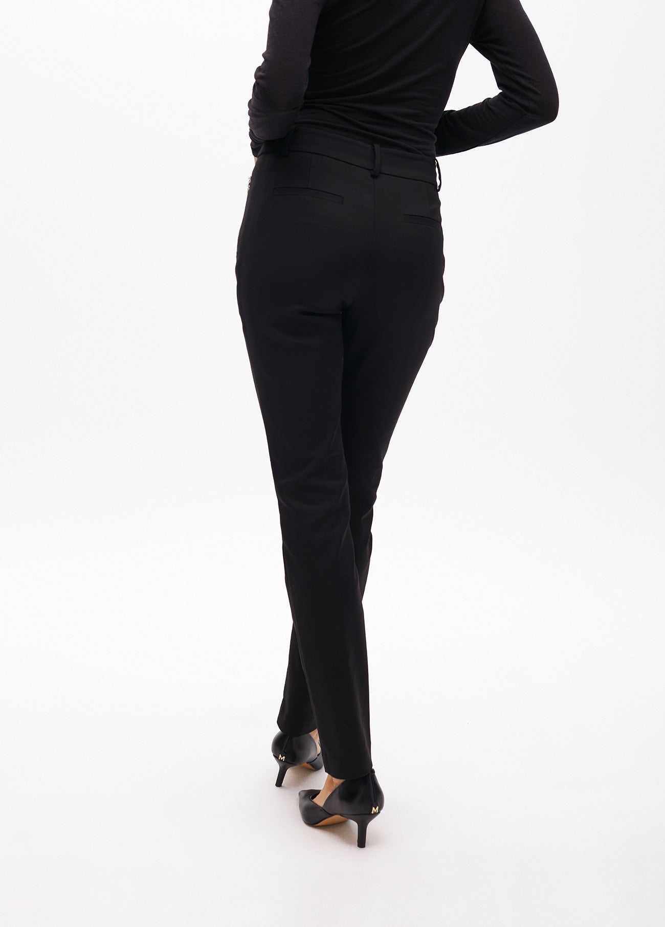 Stretch fabric trousers with zipped pocket