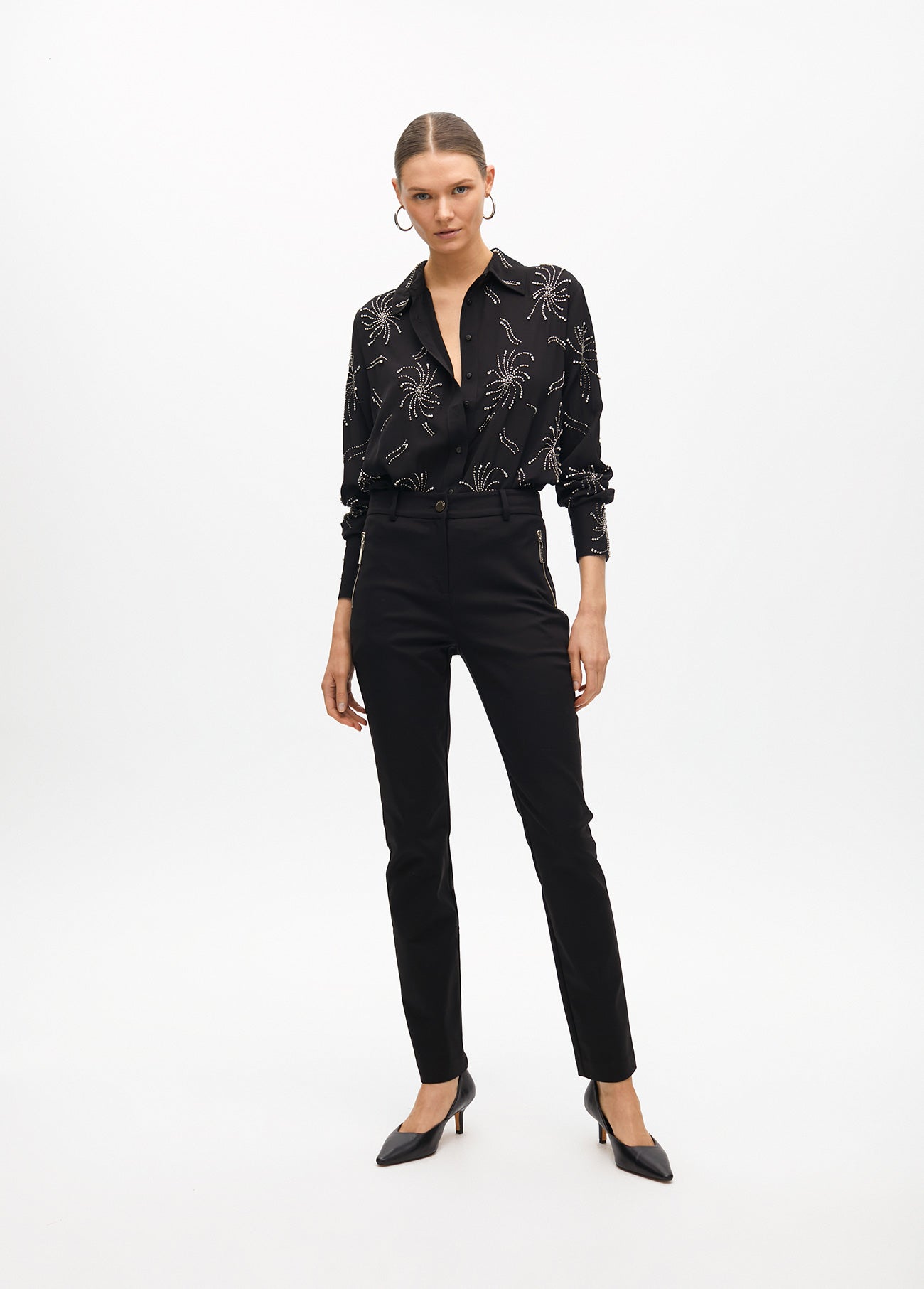 Stretch fabric trousers with zipped pocket