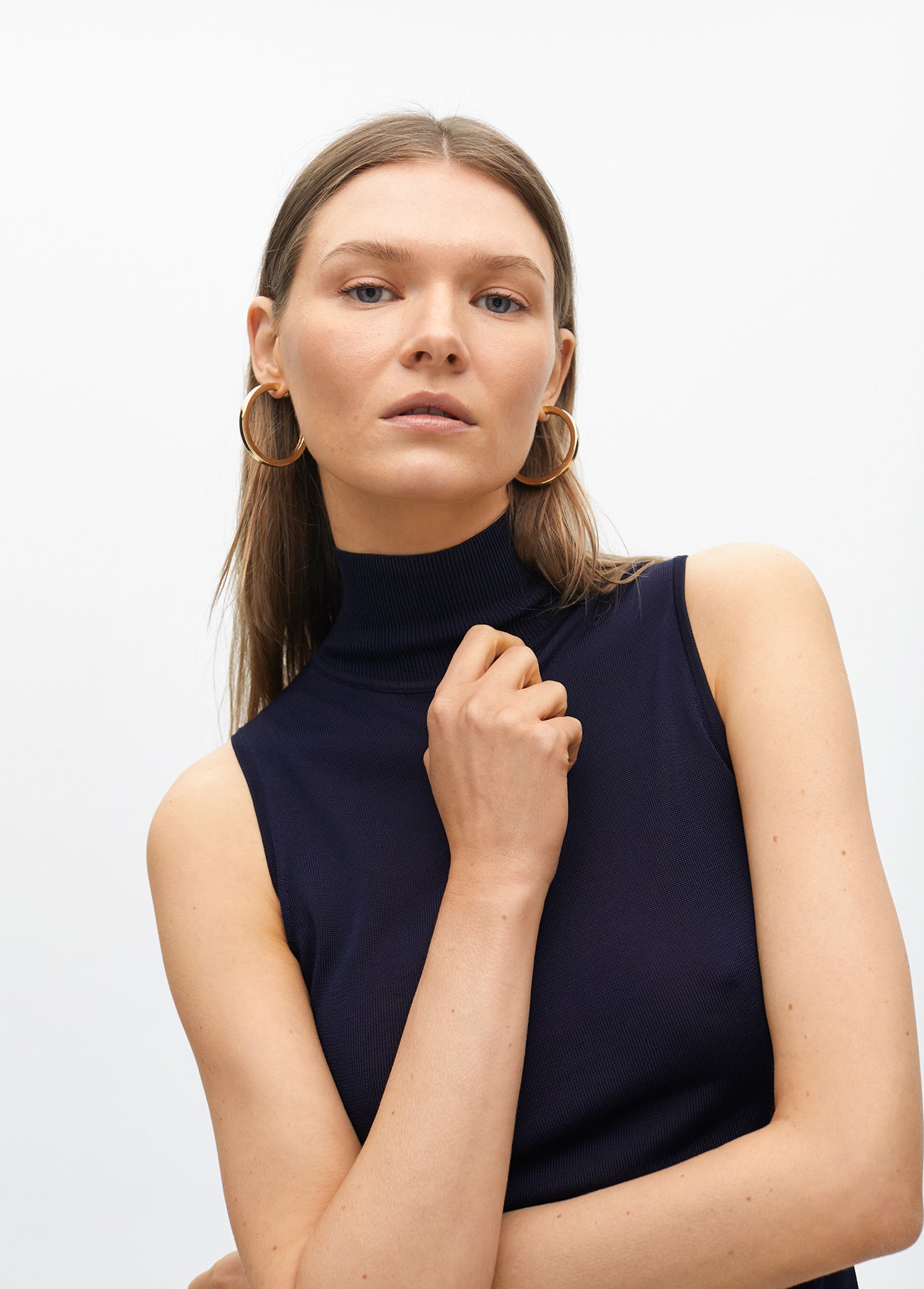Sleeveless High Neck Knit Top