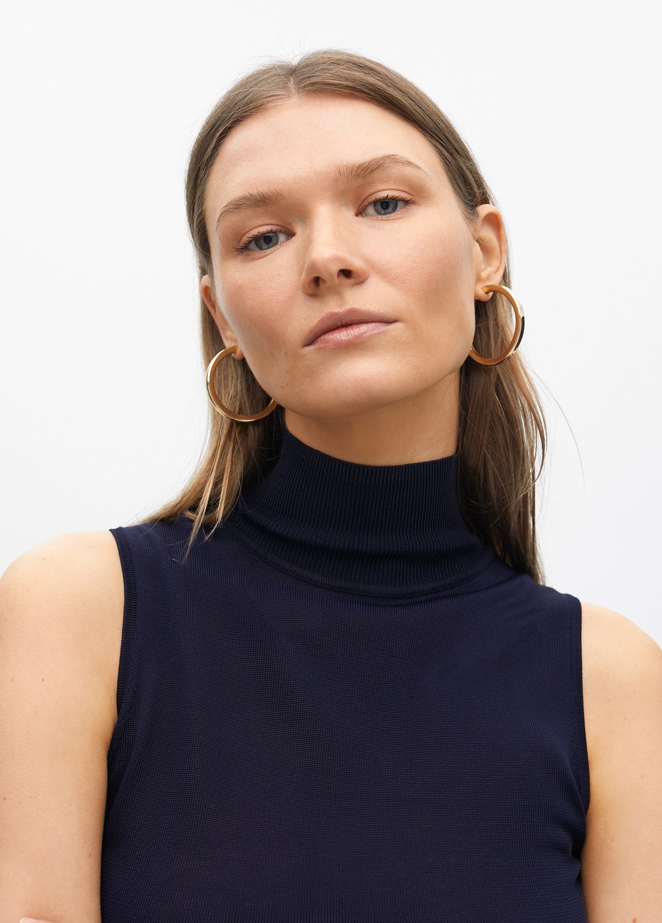 Sleeveless High Neck Knit Top