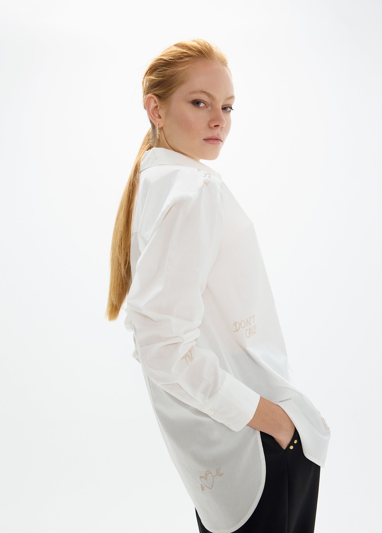 mf2615003-Oversized shirt with gold studs with positioned drawings-White