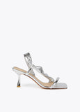 Heeled sandals with metallic straps