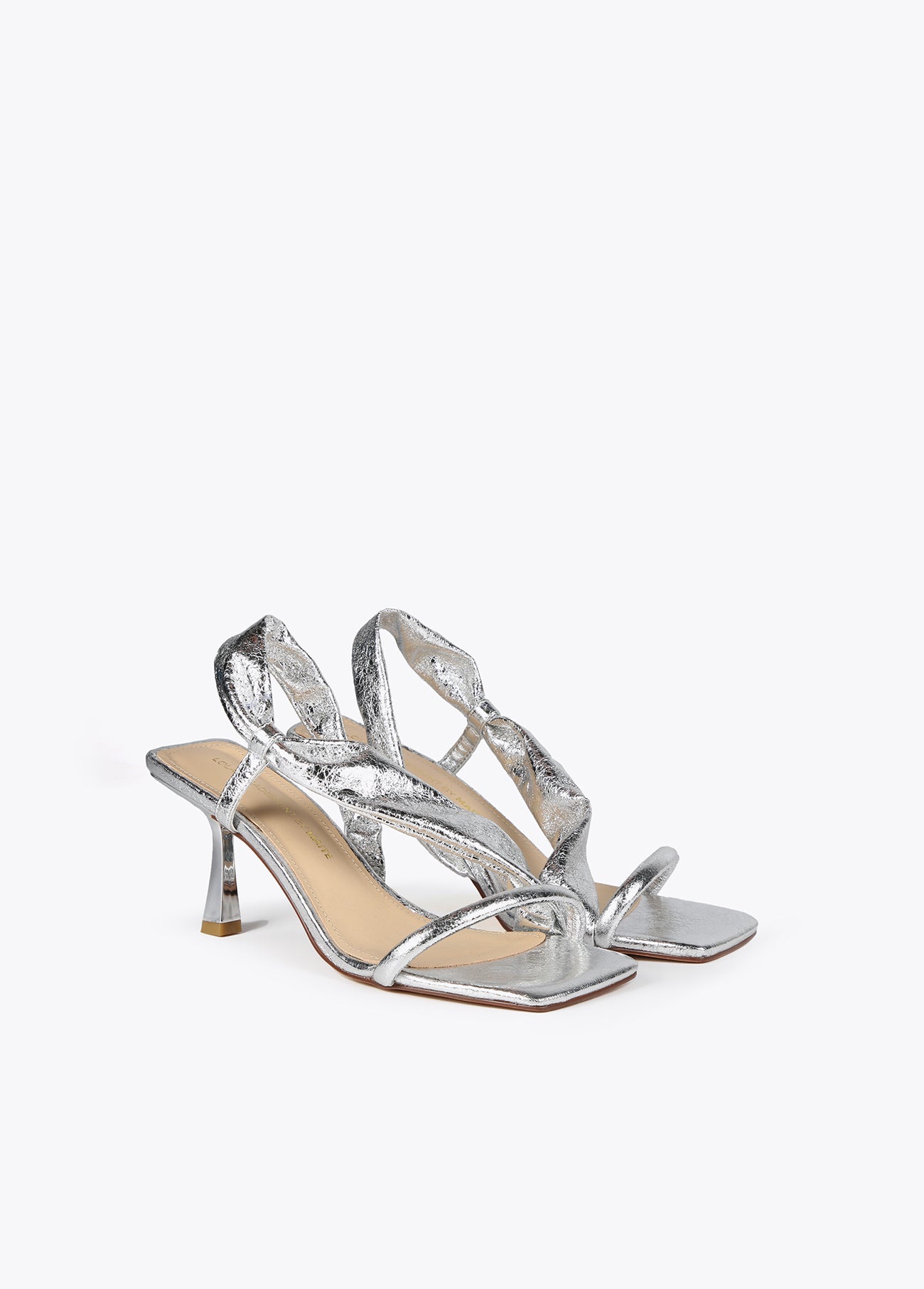 Heeled sandals with metallic straps