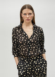 Black polka dot shirt