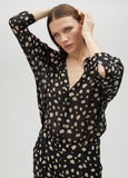 Black polka dot shirt