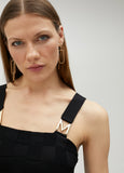 Knit dress with M detail on the strap