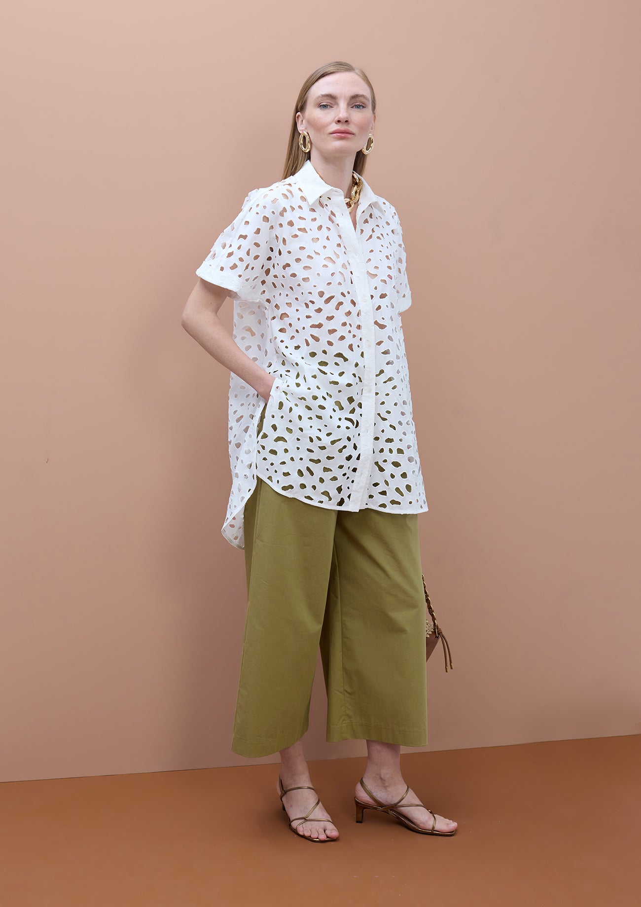 Oversized short sleeved shirt with perforated detailing