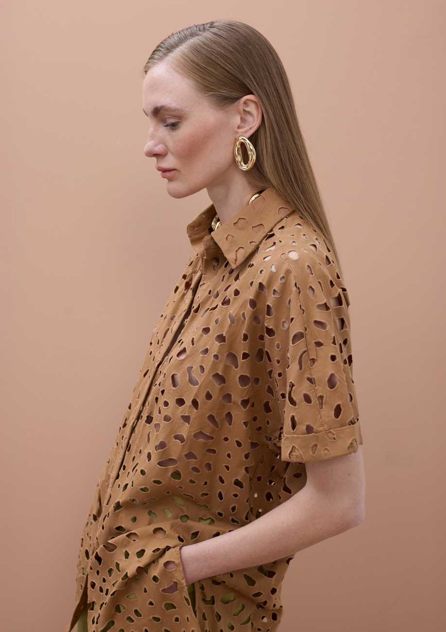 Oversized short sleeved shirt with perforated detailing