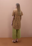 Oversized short sleeved shirt with perforated detailing