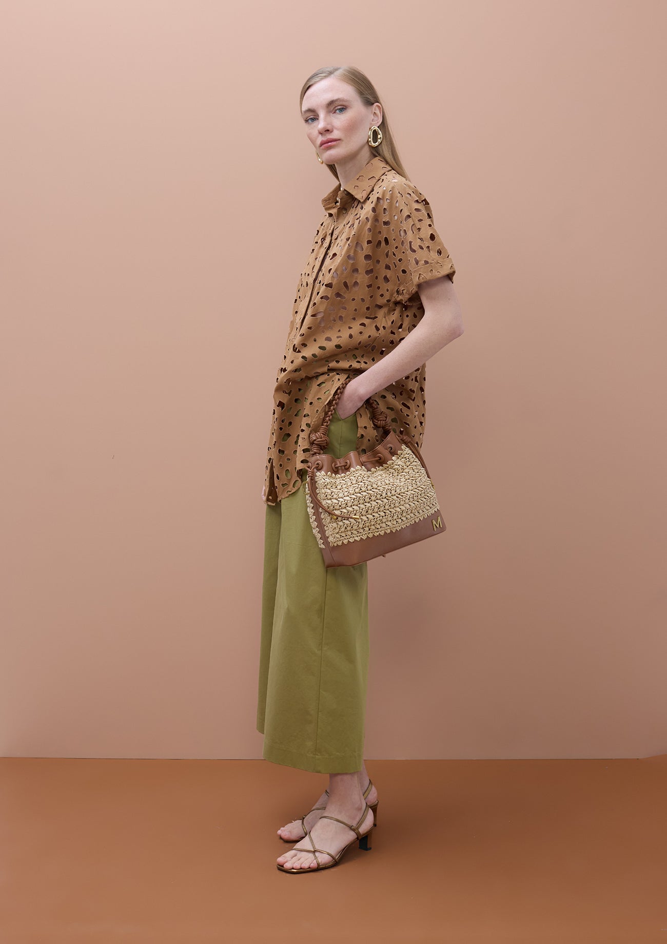 Oversized short sleeved shirt with perforated detailing