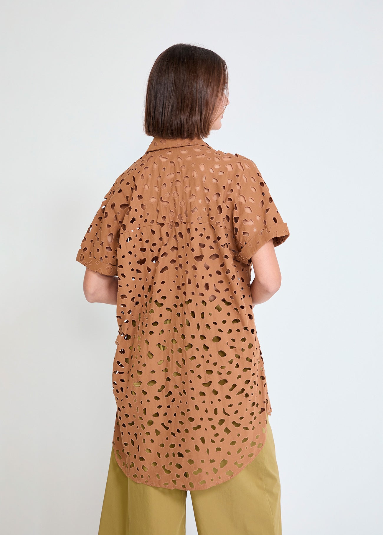 Oversized short sleeved shirt with perforated detailing